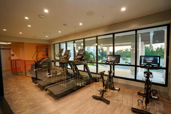 a view of a balcony with chairs
