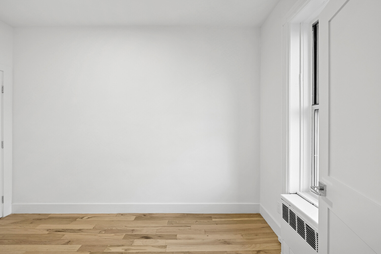 145 West 80th Street, Unit 4R Manhattan, NY 10024 - Photo 11 of 16 a view of a room with wooden floor and white walls