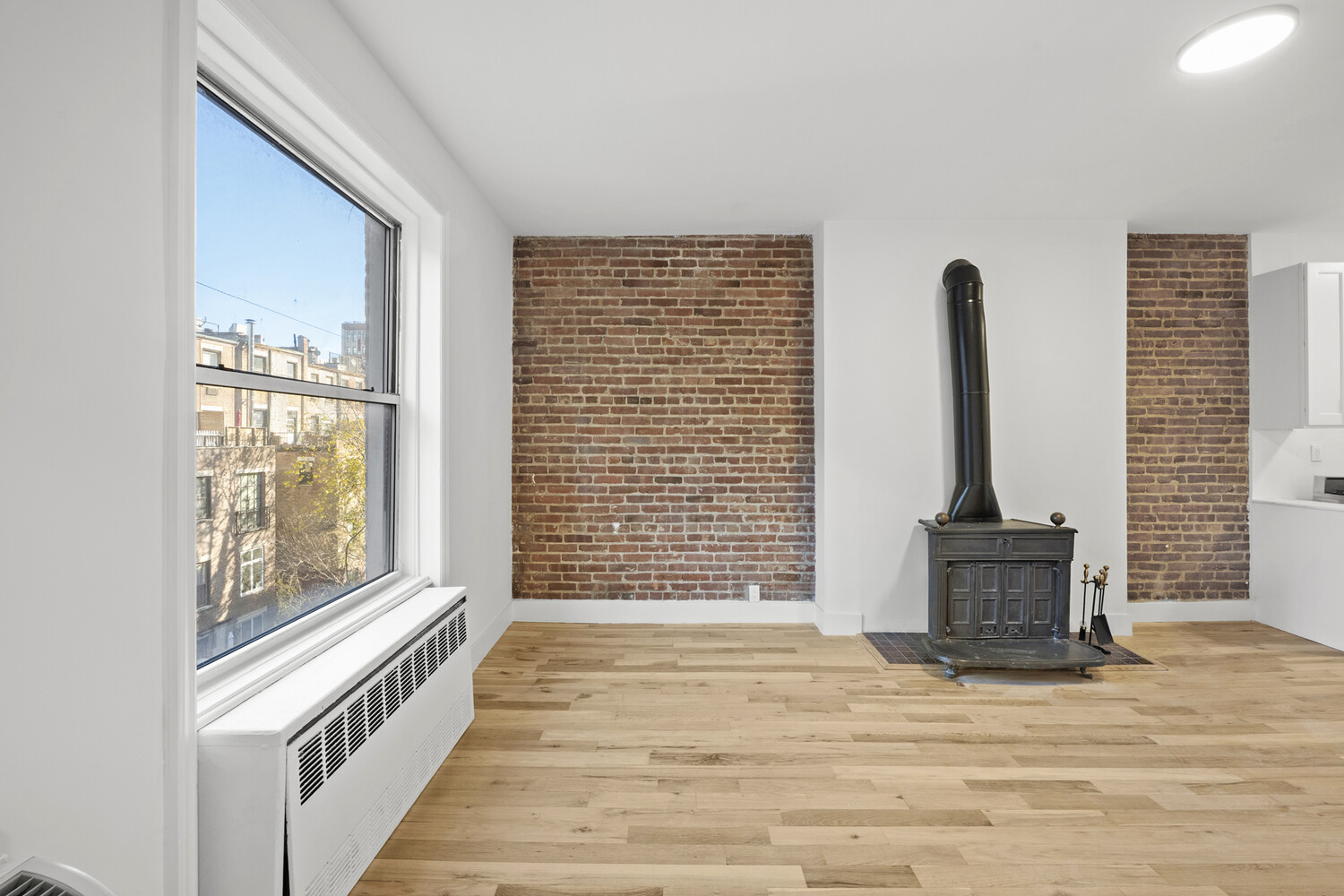 145 West 80th Street, Unit 4R Manhattan, NY 10024 - Photo 12 of 16 a view of an empty room with a window