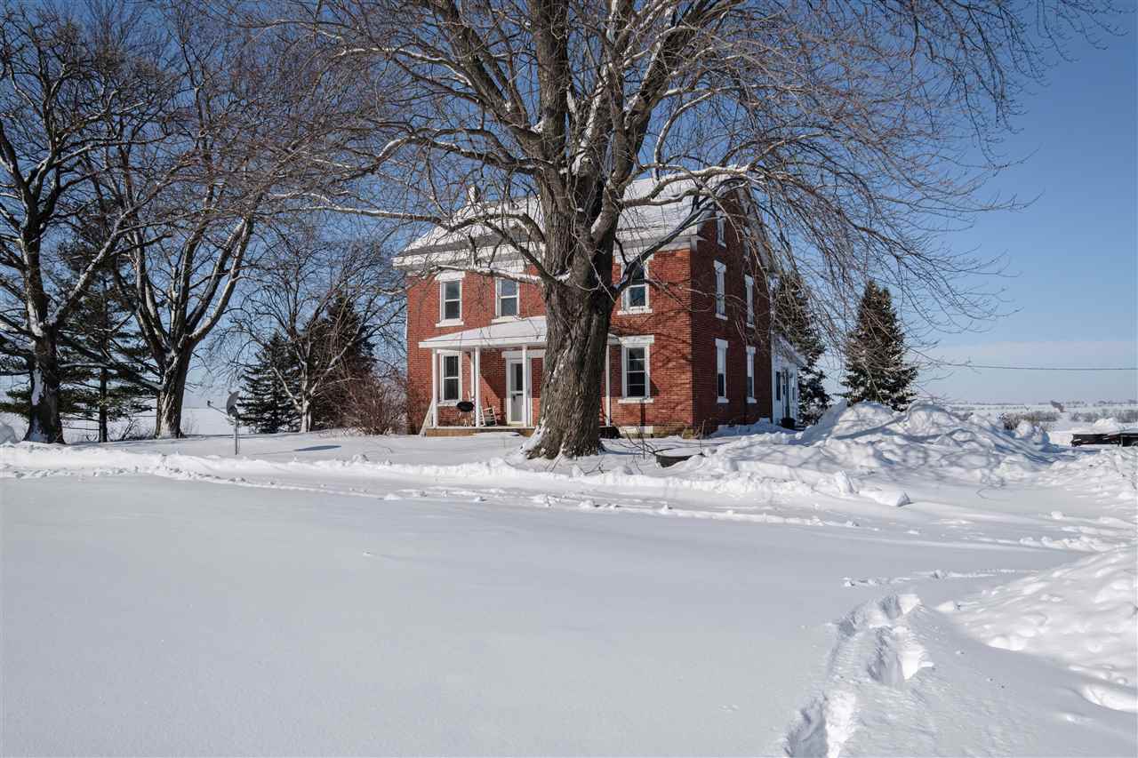 a view of a house with a snow