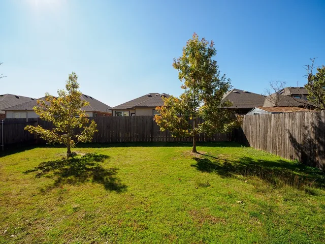 a fire hydrant in the middle of a field
