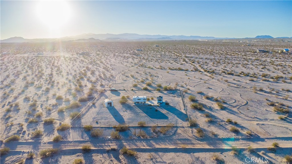 1188 Mile Square Road Joshua Tree, CA 92252 - Photo 12 of 18 an aerial view of house with yard