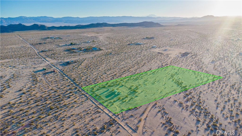 1188 Mile Square Road Joshua Tree, CA 92252 - Photo 16 of 18 a view of a mountain with a outdoor space
