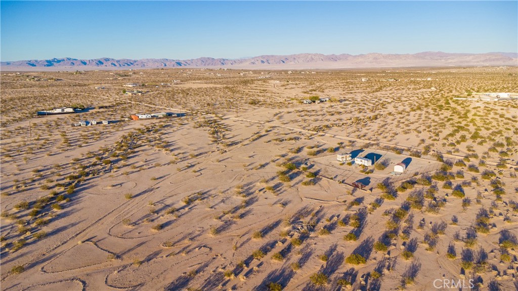 1188 Mile Square Road Joshua Tree, CA 92252 - Photo 2 of 18 a view of an ocean