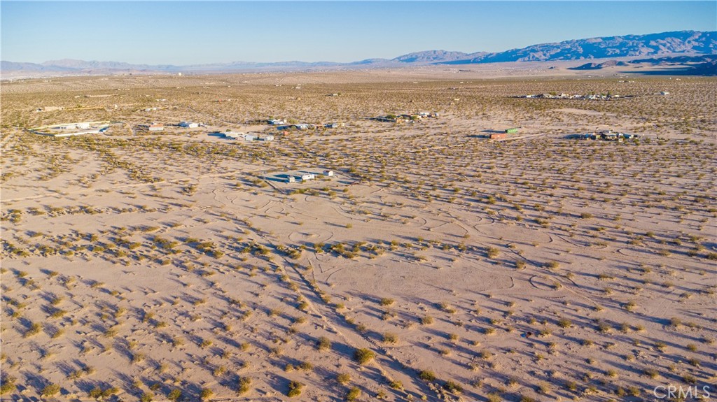 1188 Mile Square Road Joshua Tree, CA 92252 - Photo 3 of 18 a view of an ocean beach
