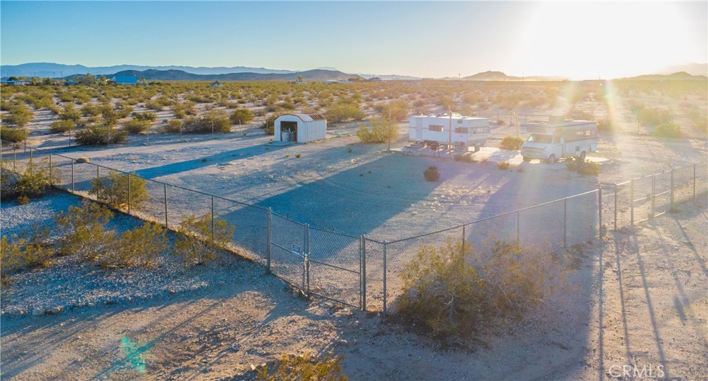 1188 Mile Square Road Joshua Tree, CA 92252 - Photo 9 of 18 a view of a city with ocean view