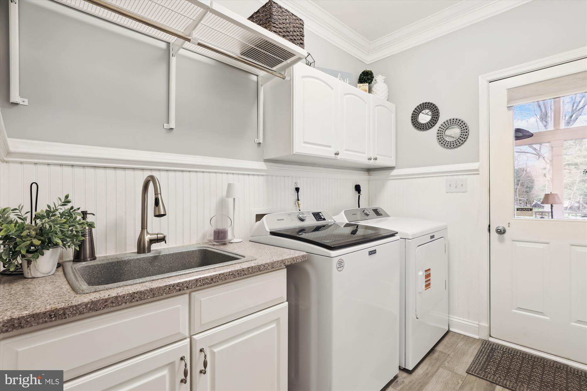 10904 Hunter Gate Way Reston, VA 20194 - Photo 26 of 90 a kitchen with stainless steel appliances granite countertop a sink and a refrigerator