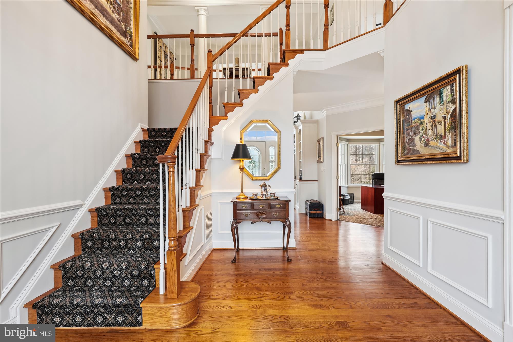 10904 Hunter Gate Way Reston, VA 20194 - Photo 28 of 90 a view of entryway livingroom and hall with wooden floor