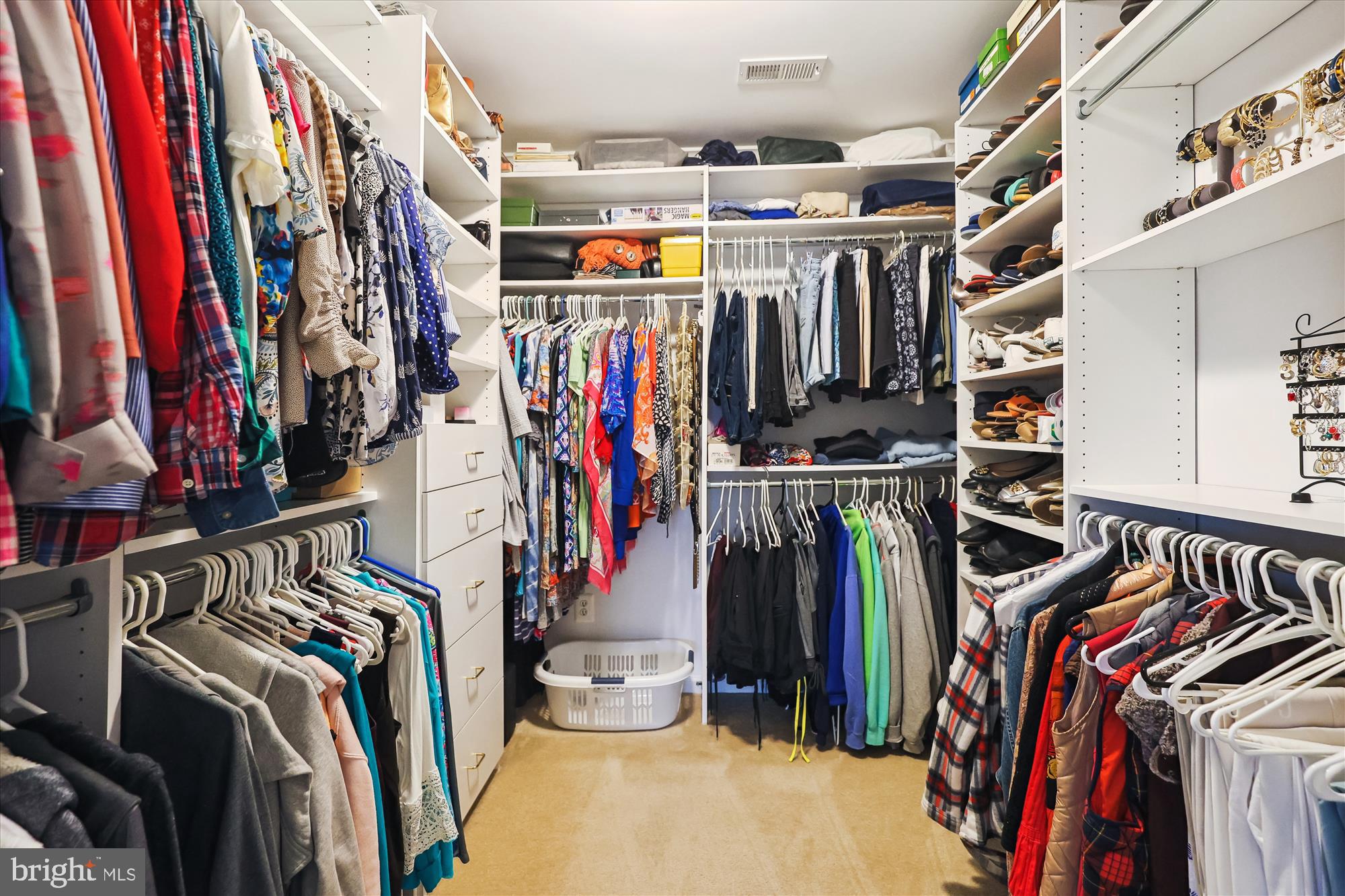 10904 Hunter Gate Way Reston, VA 20194 - Photo 39 of 90 a view of walk in closet with clothes
