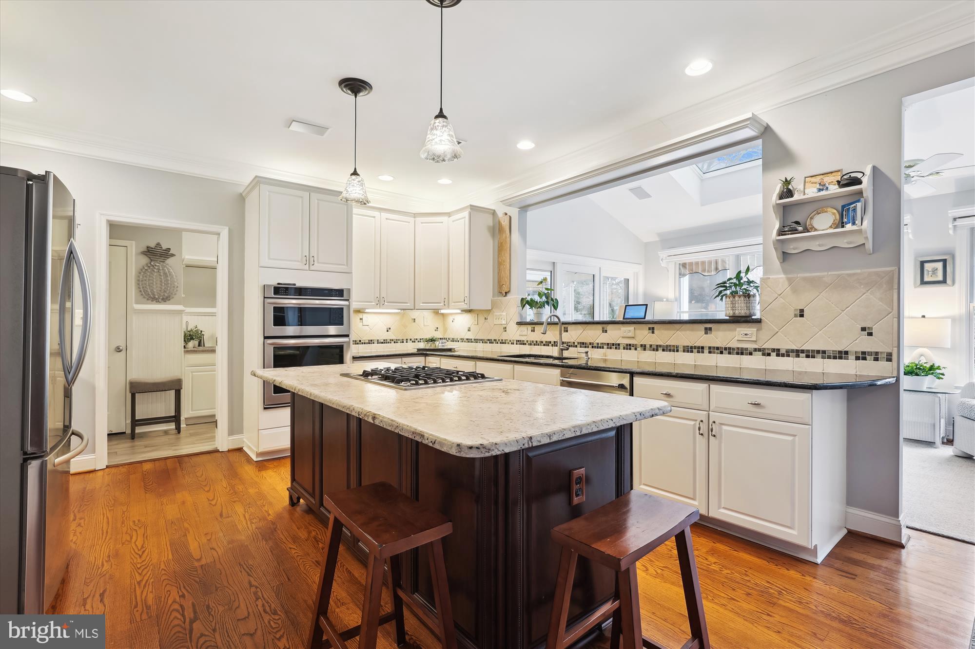 10904 Hunter Gate Way Reston, VA 20194 - Photo 4 of 90 a kitchen with stainless steel appliances granite countertop a sink stove and refrigerator