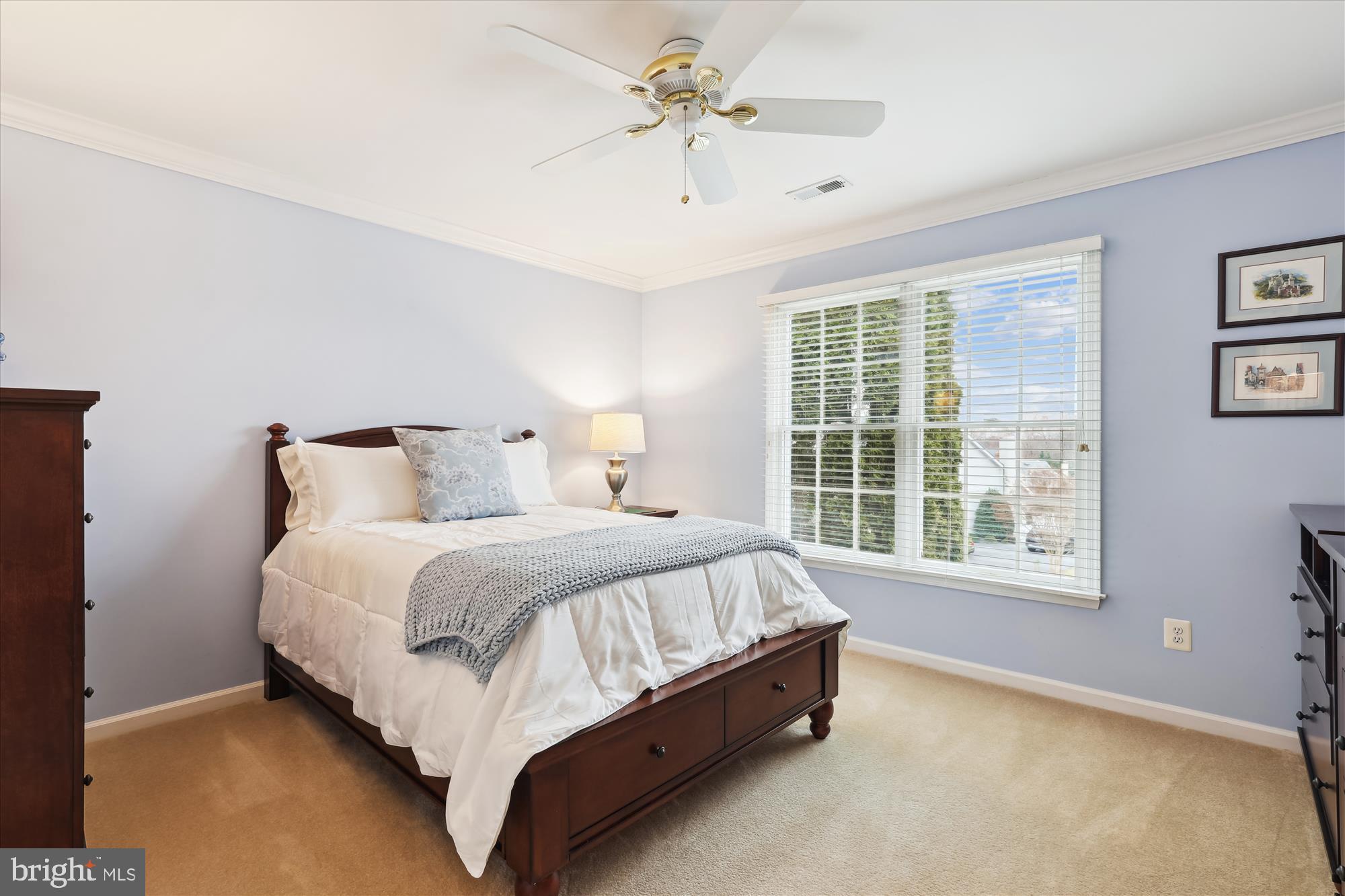 10904 Hunter Gate Way Reston, VA 20194 - Photo 47 of 90 a bed sitting in a bedroom next to a window