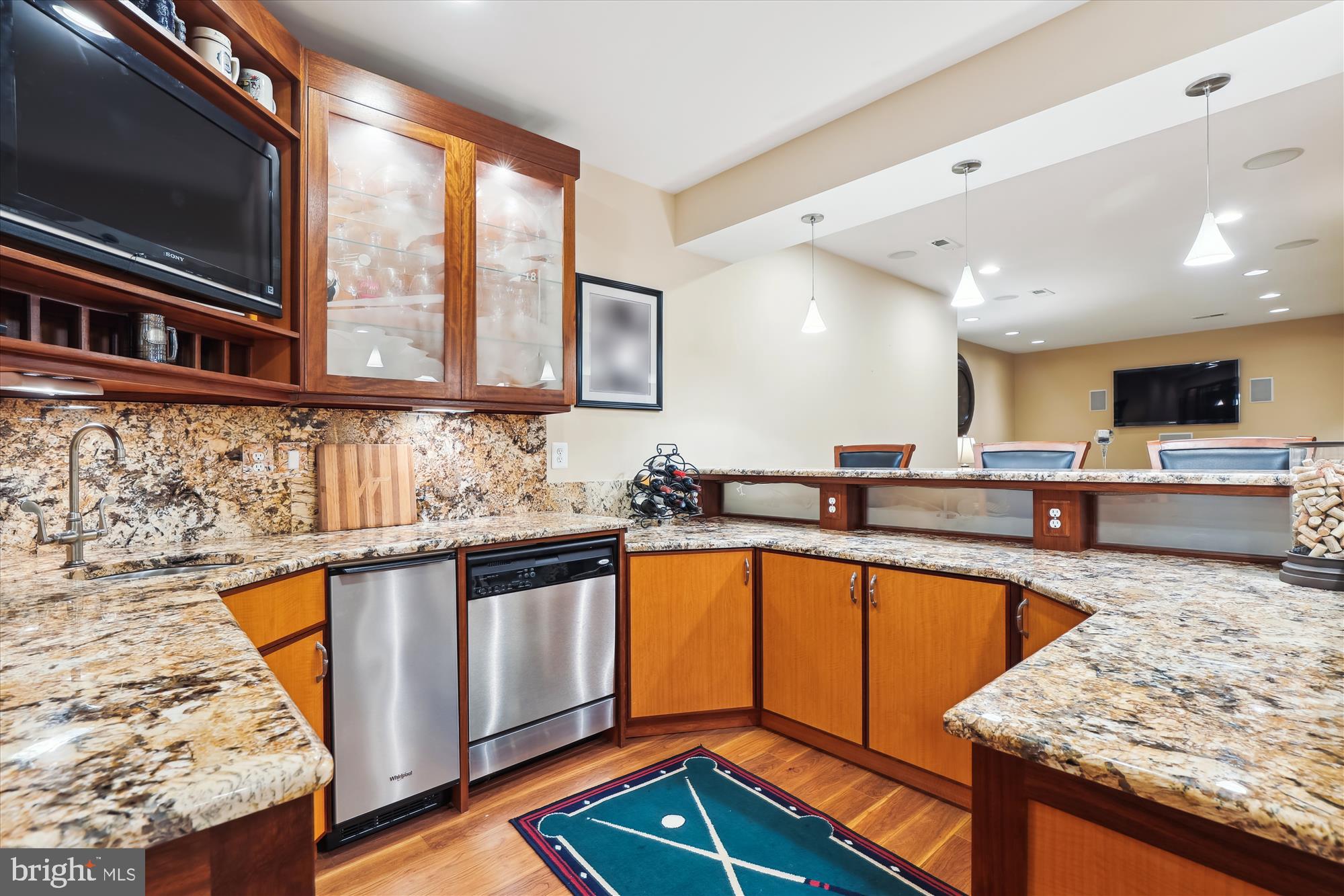 10904 Hunter Gate Way Reston, VA 20194 - Photo 54 of 90 a kitchen with stainless steel appliances granite countertop a sink and dishwasher a stove with wooden floor
