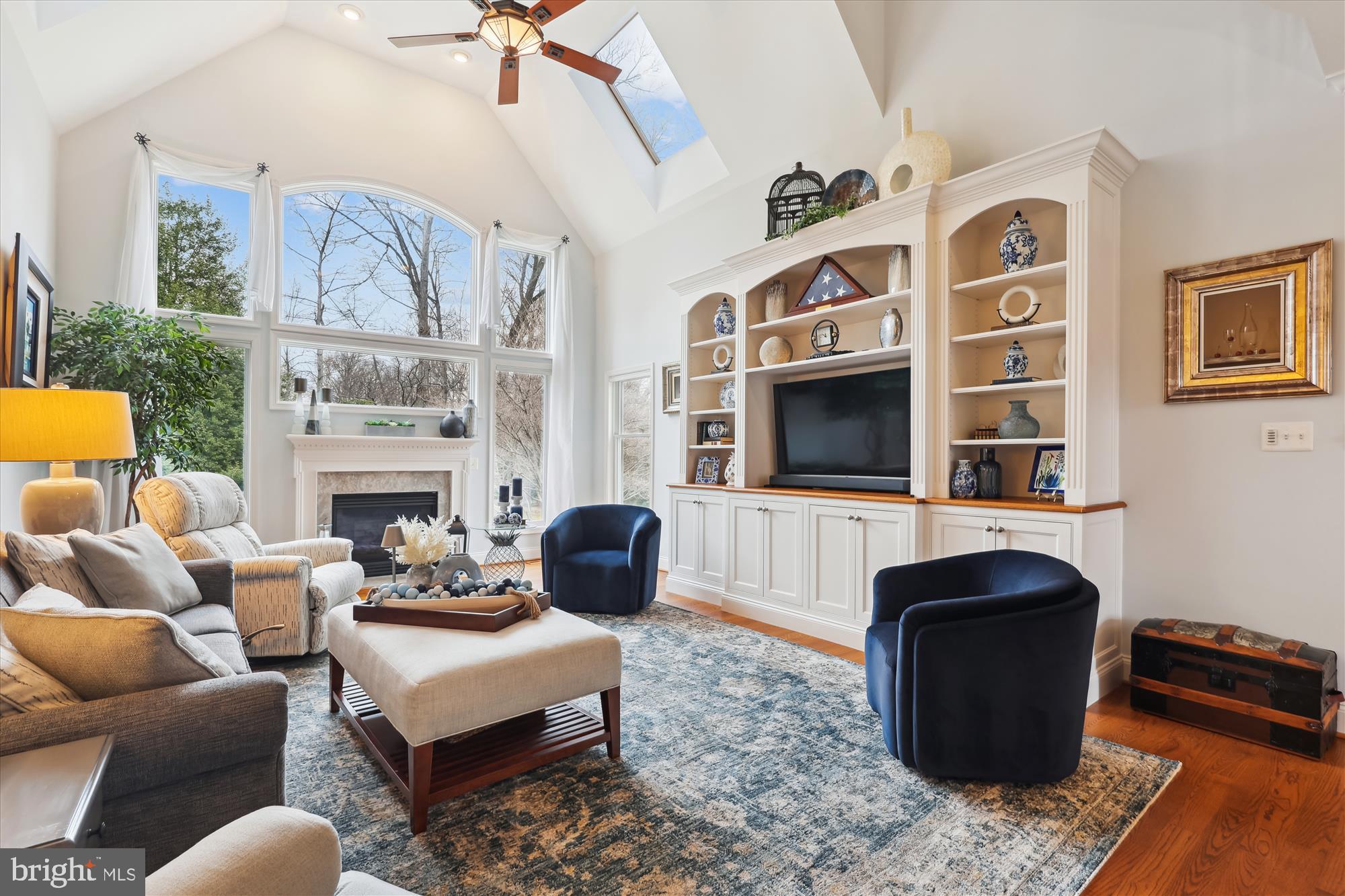 10904 Hunter Gate Way Reston, VA 20194 - Photo 8 of 90 a living room with furniture fireplace and flat screen tv