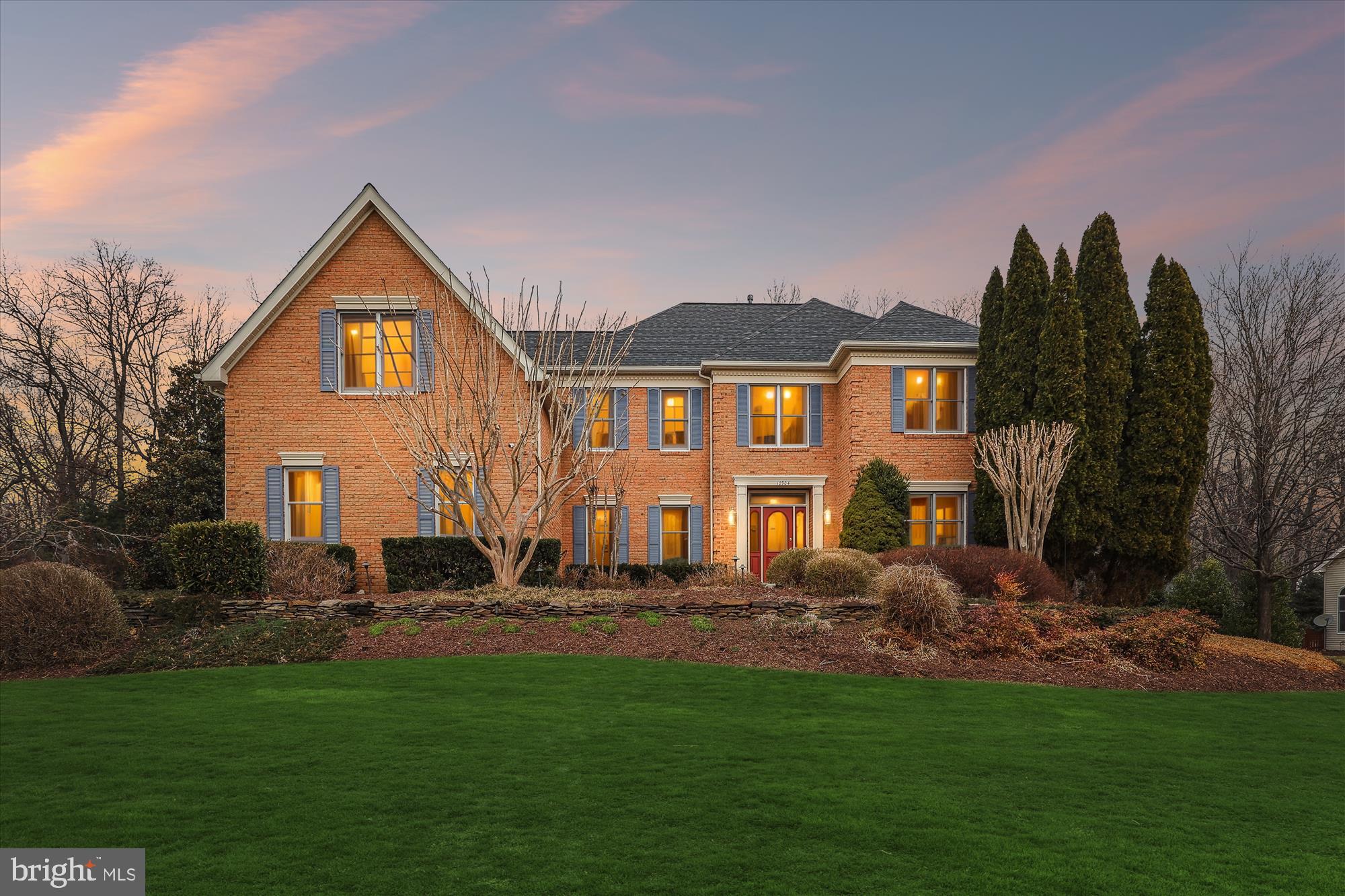 10904 Hunter Gate Way Reston, VA 20194 - Photo 82 of 90 a front view of house with yard and green space