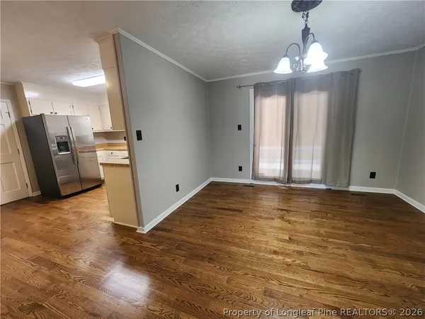 a view of a livingroom with a chandelier