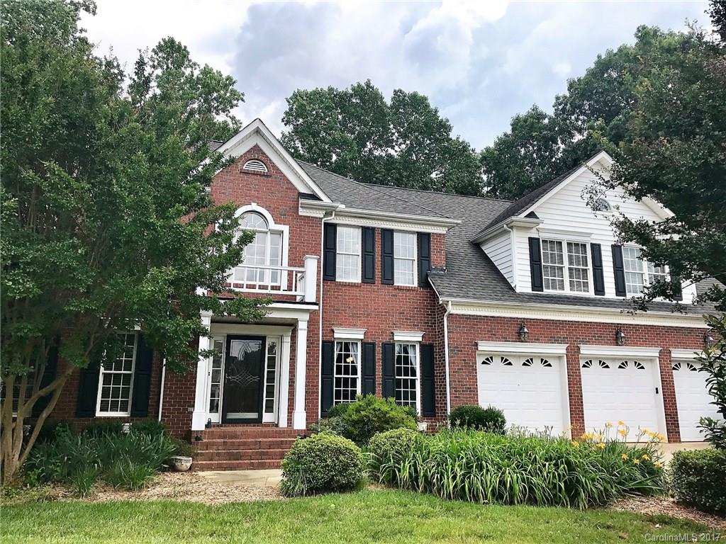522 Zackery Lane Fort Mill, SC 29708 - Photo 1 of 24 a front view of a house with a yard and trees