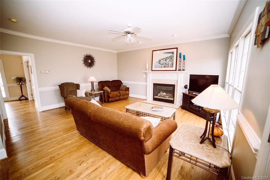 522 Zackery Lane Fort Mill, SC 29708 - Photo 8 of 24 a living room with furniture fireplace and window