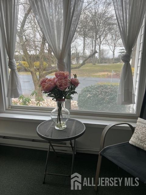 79 Davidson's Mill Road North Brunswick, NJ 08902 - Photo 14 of 30 a vase of flowers sitting on a table