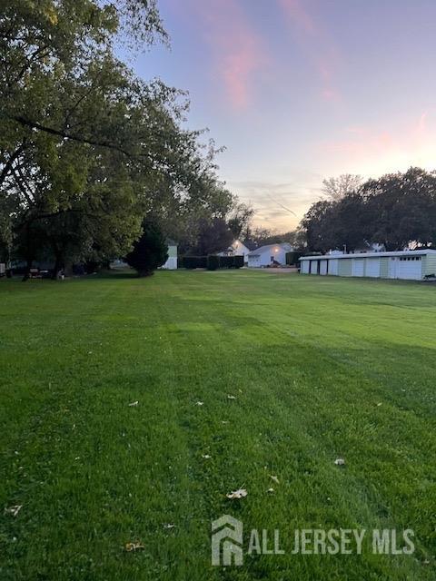 79 Davidson's Mill Road North Brunswick, NJ 08902 - Photo 4 of 30 a view of grassy field with mountain in the background