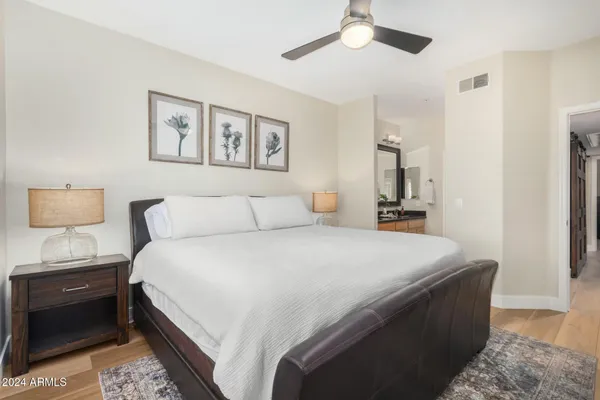 a bedroom with bed and window