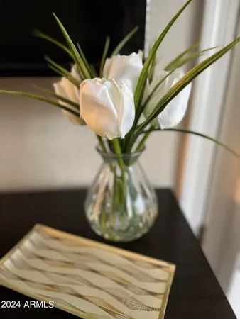 a vase of flowers sitting on a table