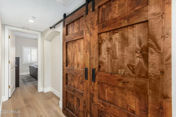 a bathroom with a shower and a sink
