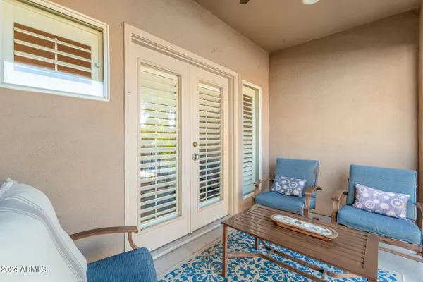 a living room with furniture and a window