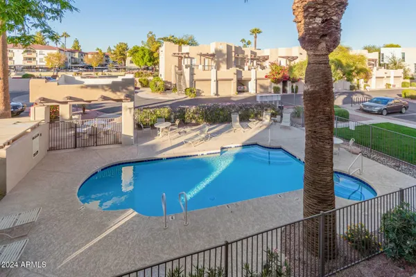 a view of a balcony with city view