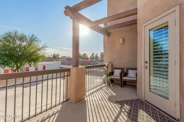a view of a balcony with couch