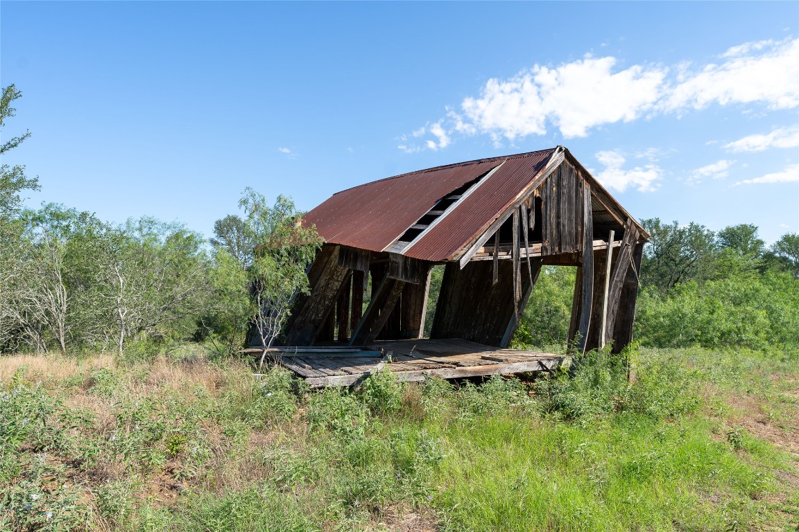 995 Carter Road Dale, TX 78616 - Photo 20 of 28 a view of a house with yard and trampoline