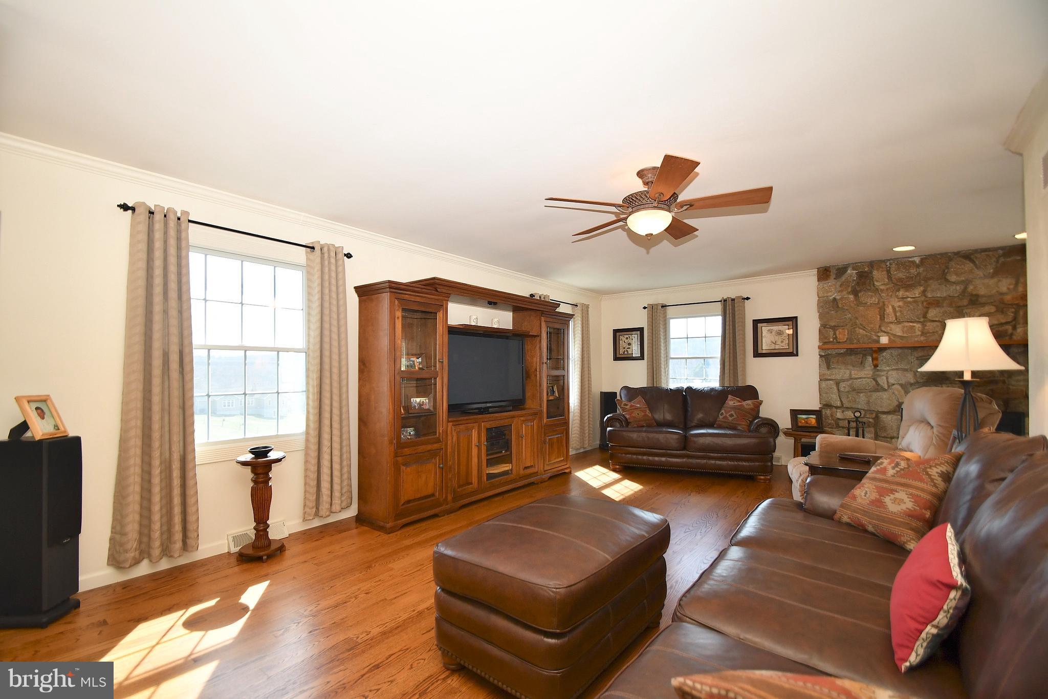 718 Cherry Hill Road Street, MD 21154 - Photo 27 of 30 Living Room w/Stone Fireplace