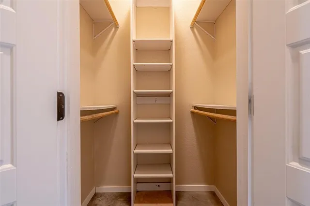 a bathroom with a sink vanity and a mirror