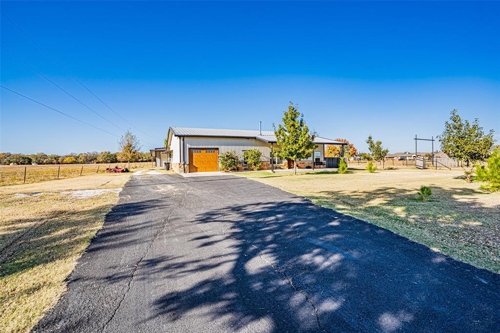 9110 Asbury Road Tolar, TX 76476 - Photo 4 of 40 Nice asphalt driveway