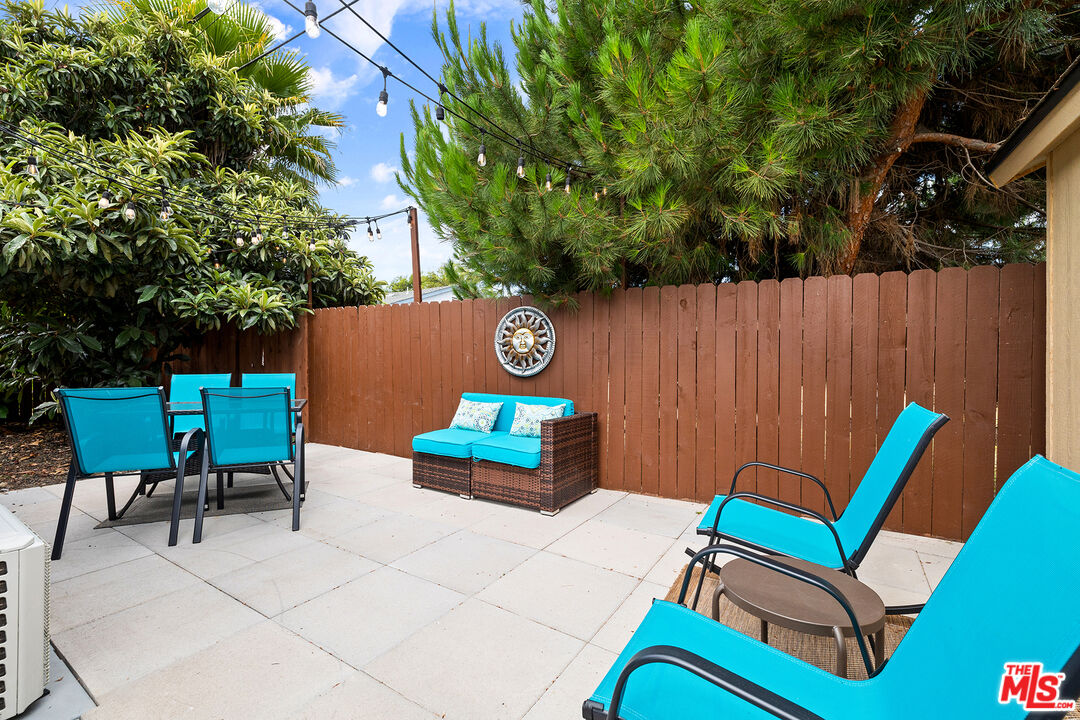5325 9th Avenue, Unit 5327 Los Angeles, CA 90043 - Photo 10 of 11 an aerial view of a chairs and table in the patio