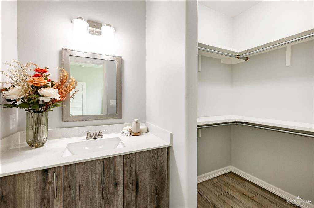 508 Bridget Street Weslaco, TX 78596 - Photo 12 of 19 a bathroom with a sink vanity and a mirror