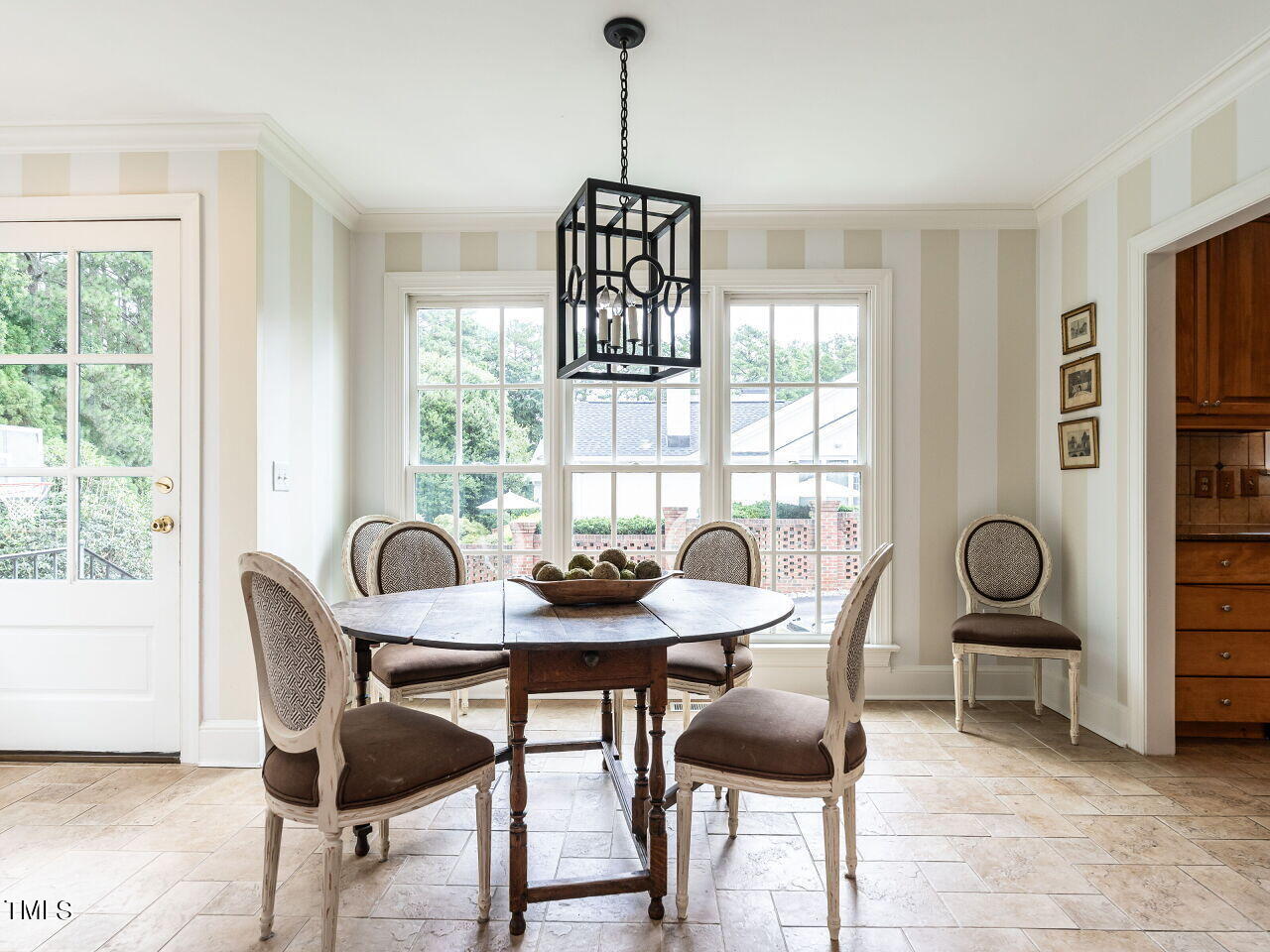 2312 Gaddy Drive Raleigh, NC 27609 - Photo 14 of 32 a dining room with furniture and window