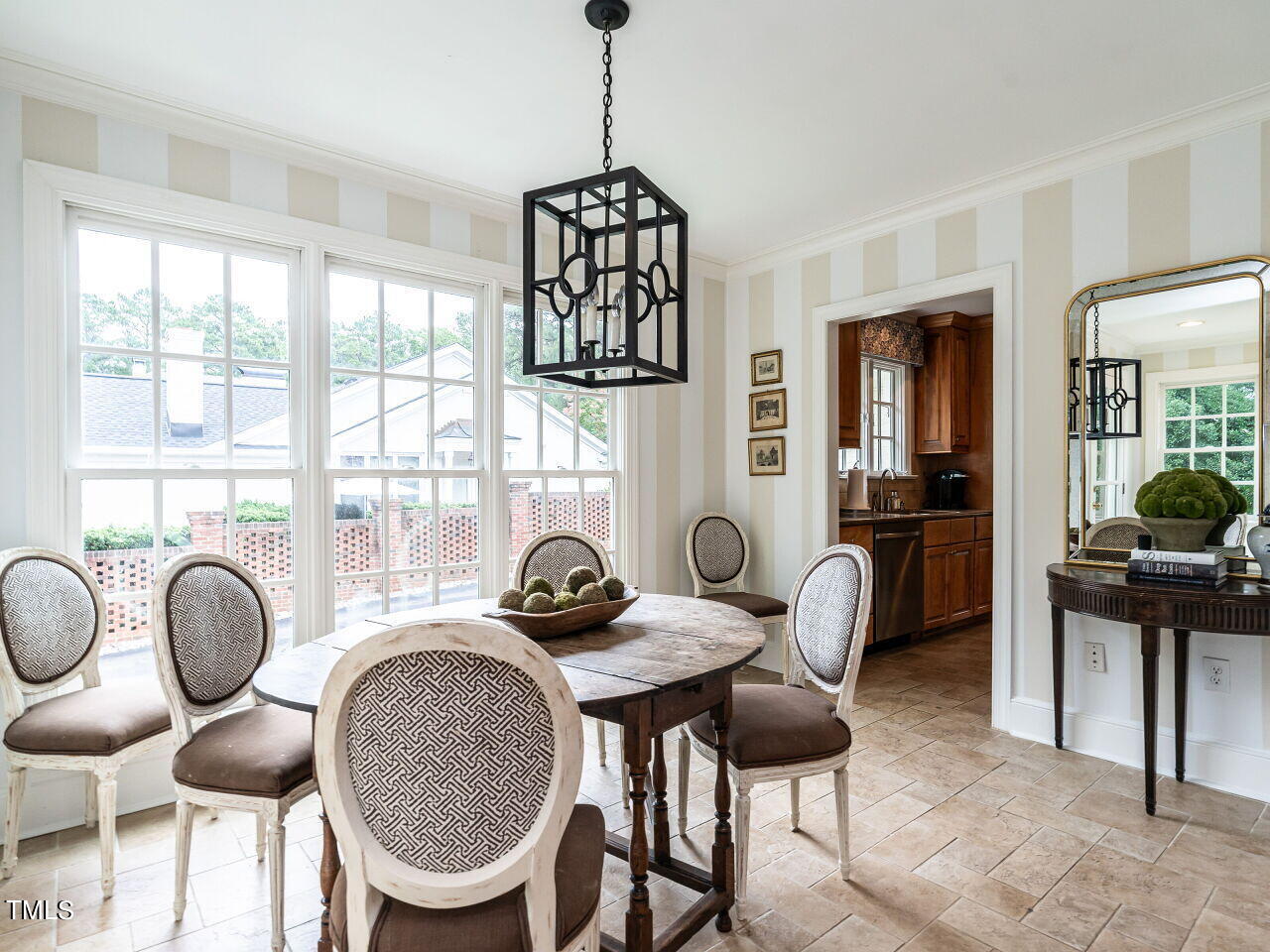 2312 Gaddy Drive Raleigh, NC 27609 - Photo 15 of 32 a dining room with furniture and window