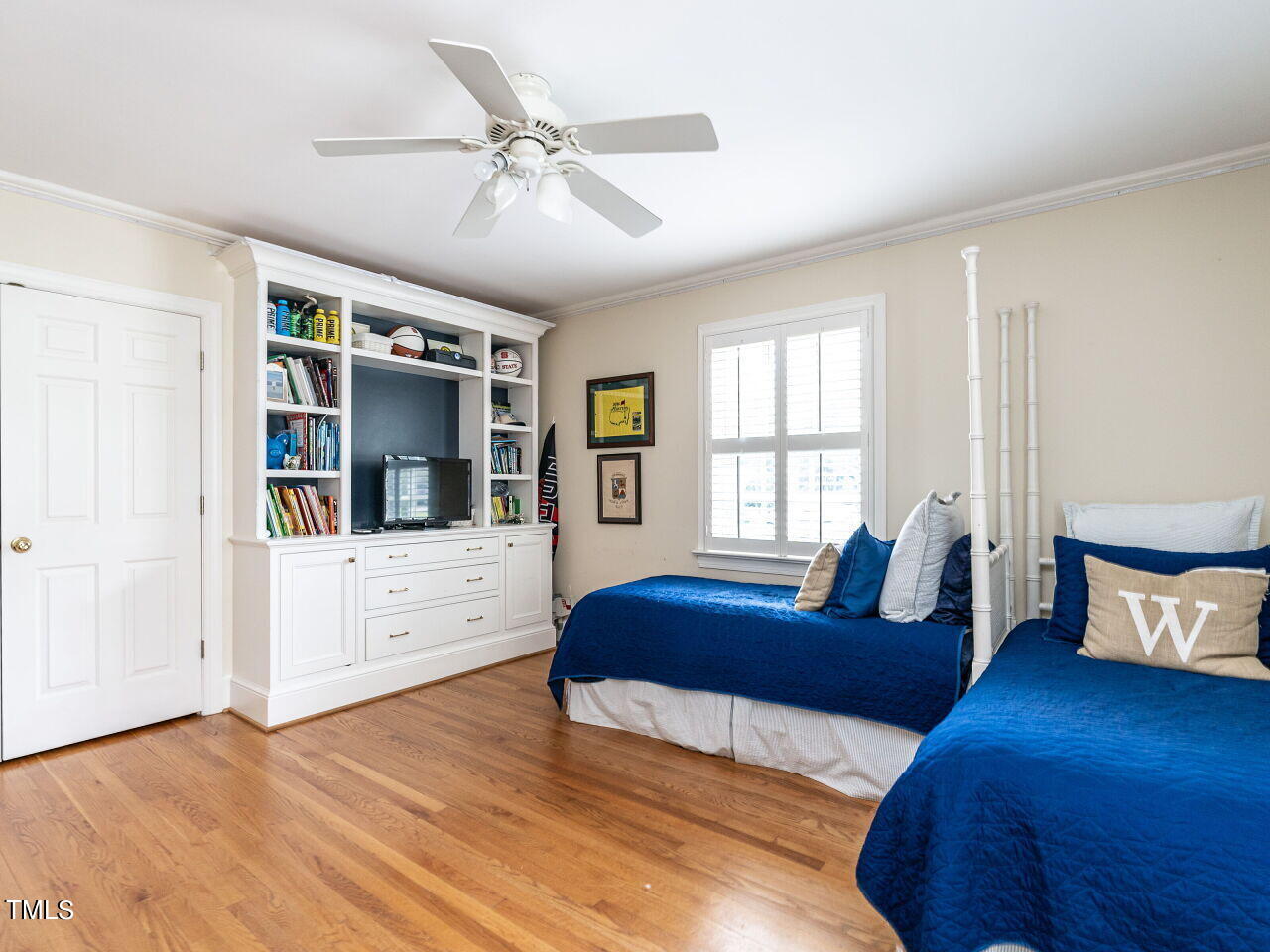2312 Gaddy Drive Raleigh, NC 27609 - Photo 24 of 32 a bedroom with a large bed and a window