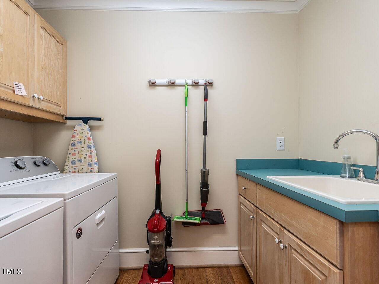 2312 Gaddy Drive Raleigh, NC 27609 - Photo 26 of 32 a bathroom with a sink and a vanity