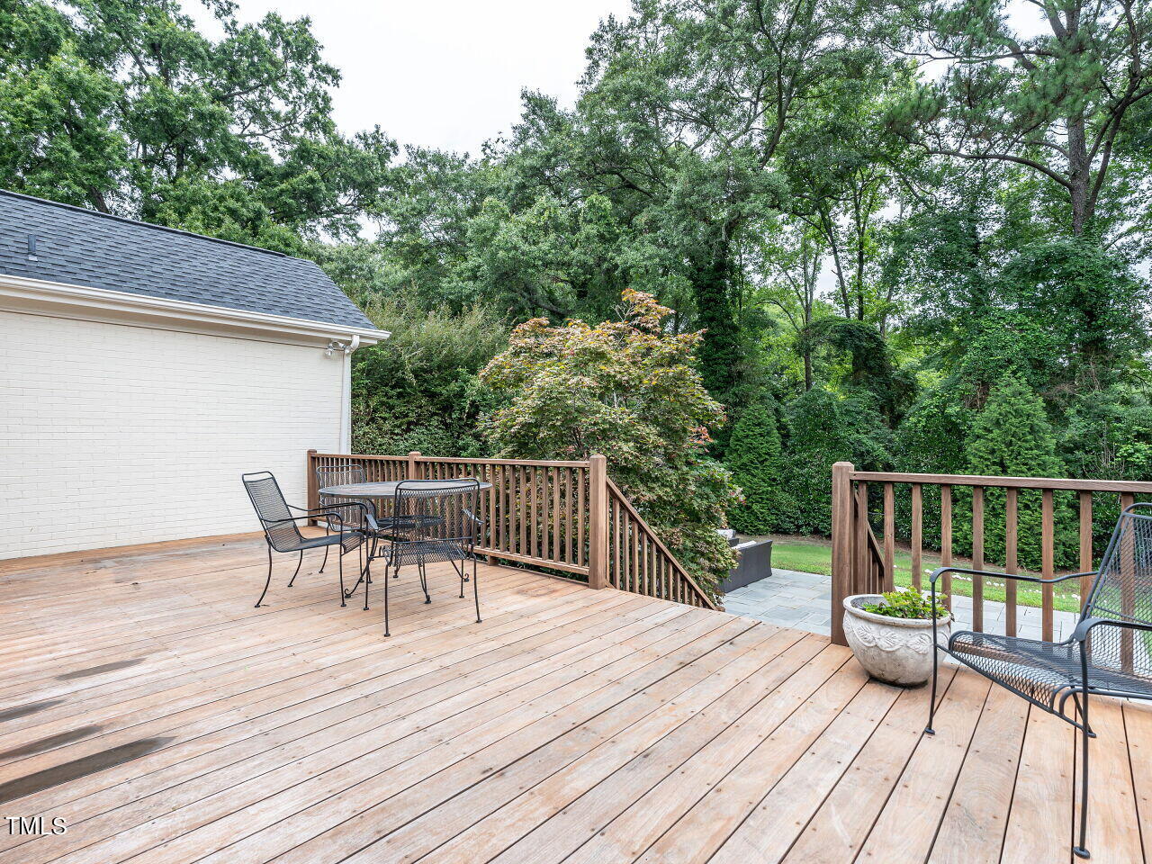 2312 Gaddy Drive Raleigh, NC 27609 - Photo 27 of 32 a view of a deck with furniture and wooden floor