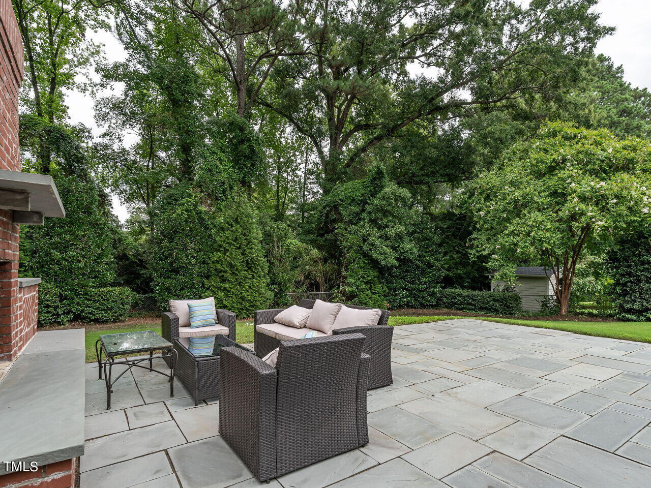 2312 Gaddy Drive Raleigh, NC 27609 - Photo 31 of 32 a view of a backyard with sitting area