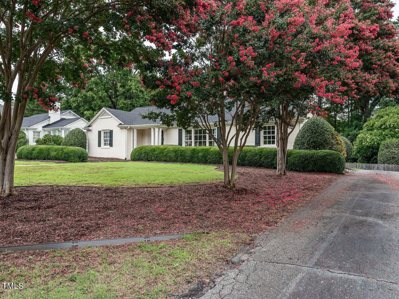 2312 Gaddy Drive Raleigh, NC 27609 - Photo 32 of 32 a front view of a house with a garden