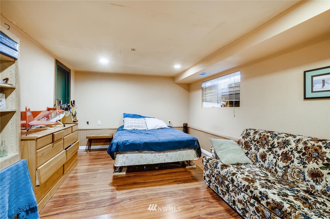 11526 Southeast Petrovitsky Road Renton, WA 98055 - Photo 18 of 28 a bedroom with a bed and a dresser