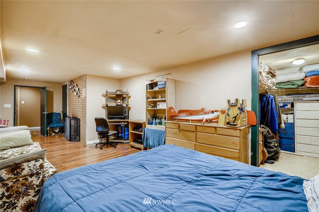 11526 Southeast Petrovitsky Road Renton, WA 98055 - Photo 19 of 28 a living room with furniture and a flat screen tv