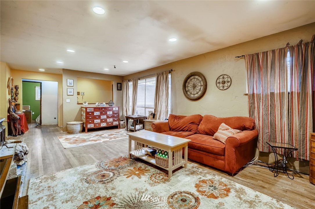 11526 Southeast Petrovitsky Road Renton, WA 98055 - Photo 6 of 28 a living room with furniture and a window