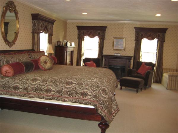87 Aspen Road Sharon, MA 02067 - Photo 10 of 22 a bedroom with a large bed and a dresser