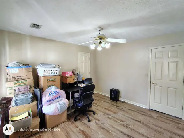 a bathroom with a toilet and a sink