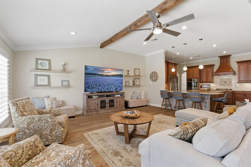 10390 Ridgecrest Street Frisco, TX 75033 - Photo 15 of 40 a living room with furniture and a flat screen tv
