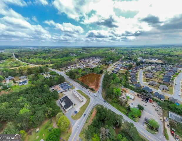 a view of houses with yard