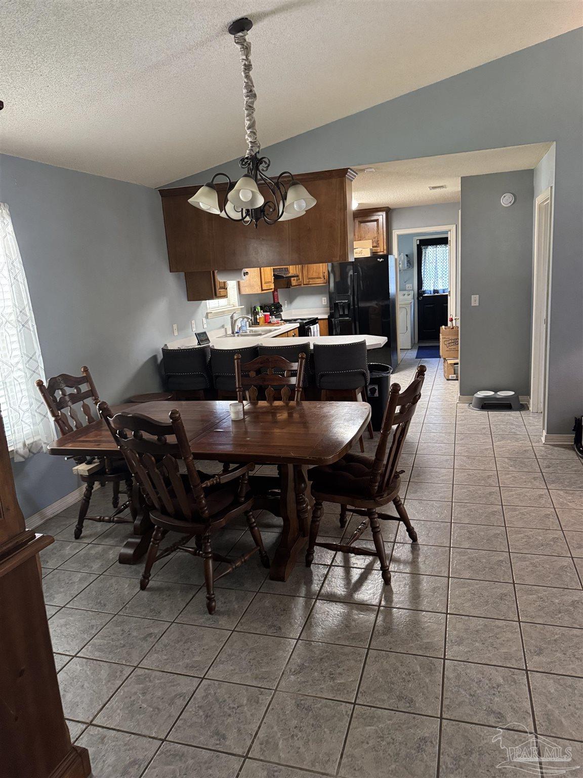 7551 McElhaney Road Century, FL 32535 - Photo 15 of 43 a view of a dining room with furniture